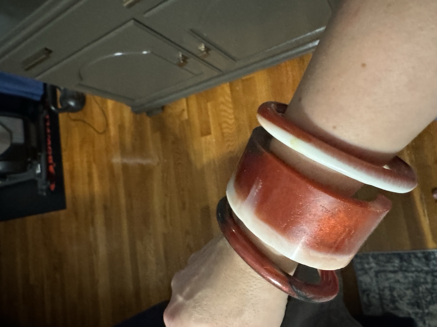 Resin bangles stacked on a wrist